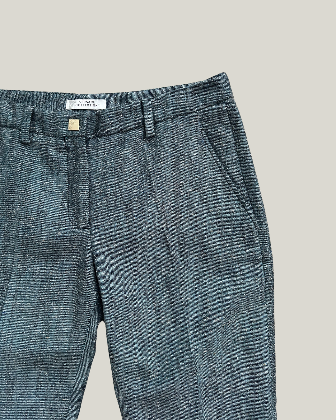 close-up of blue versace pants