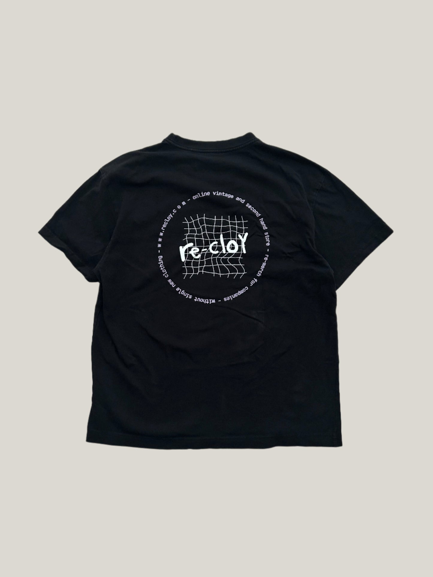 Black re-cloy merch t-shirt with a white logo on a beige background