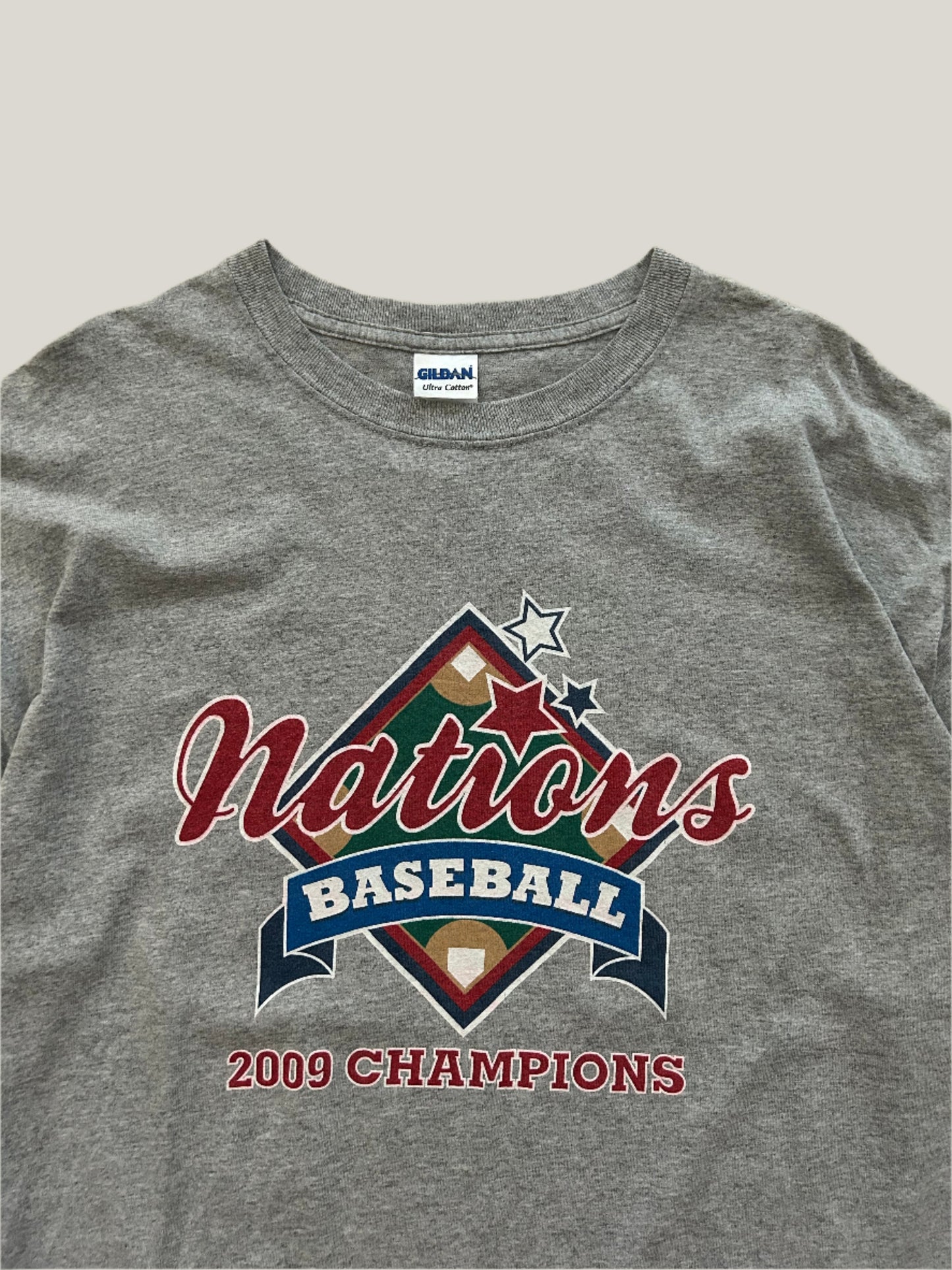 Gray t-shirt with 'Nations Baseball 2009 Champions' design