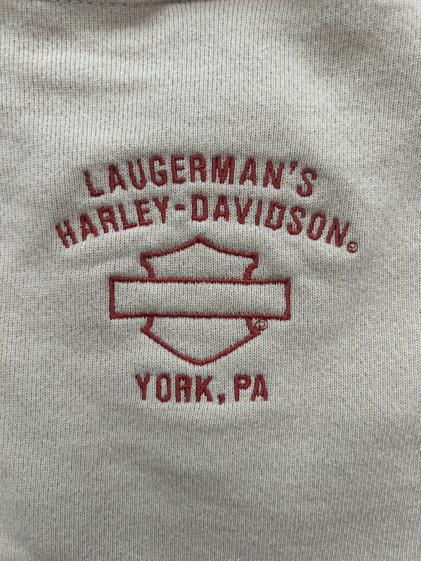 beige sweatshirt with 'Laugerman's Harley-Davidson York, PA' logo.