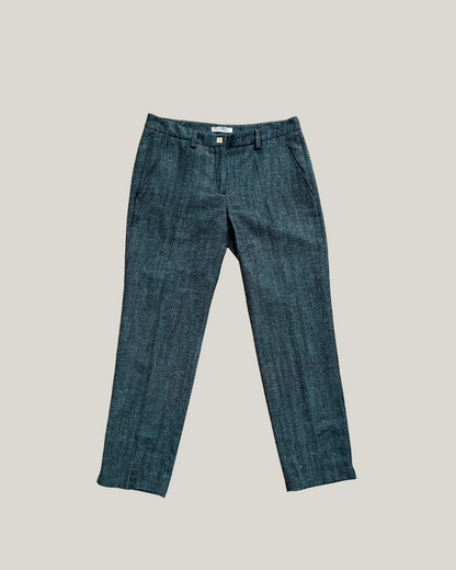 Blue versace pants on a beige background