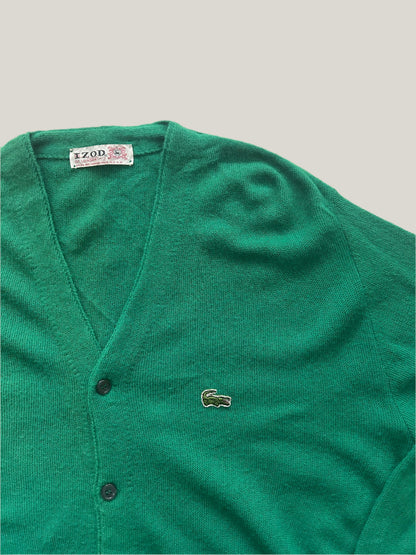 Green vintage Lacoste cardigan on a light gray background
