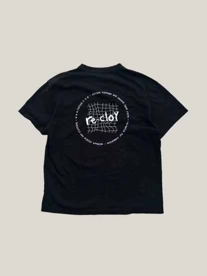 Black re-cloy merch t-shirt with a white logo on a beige background