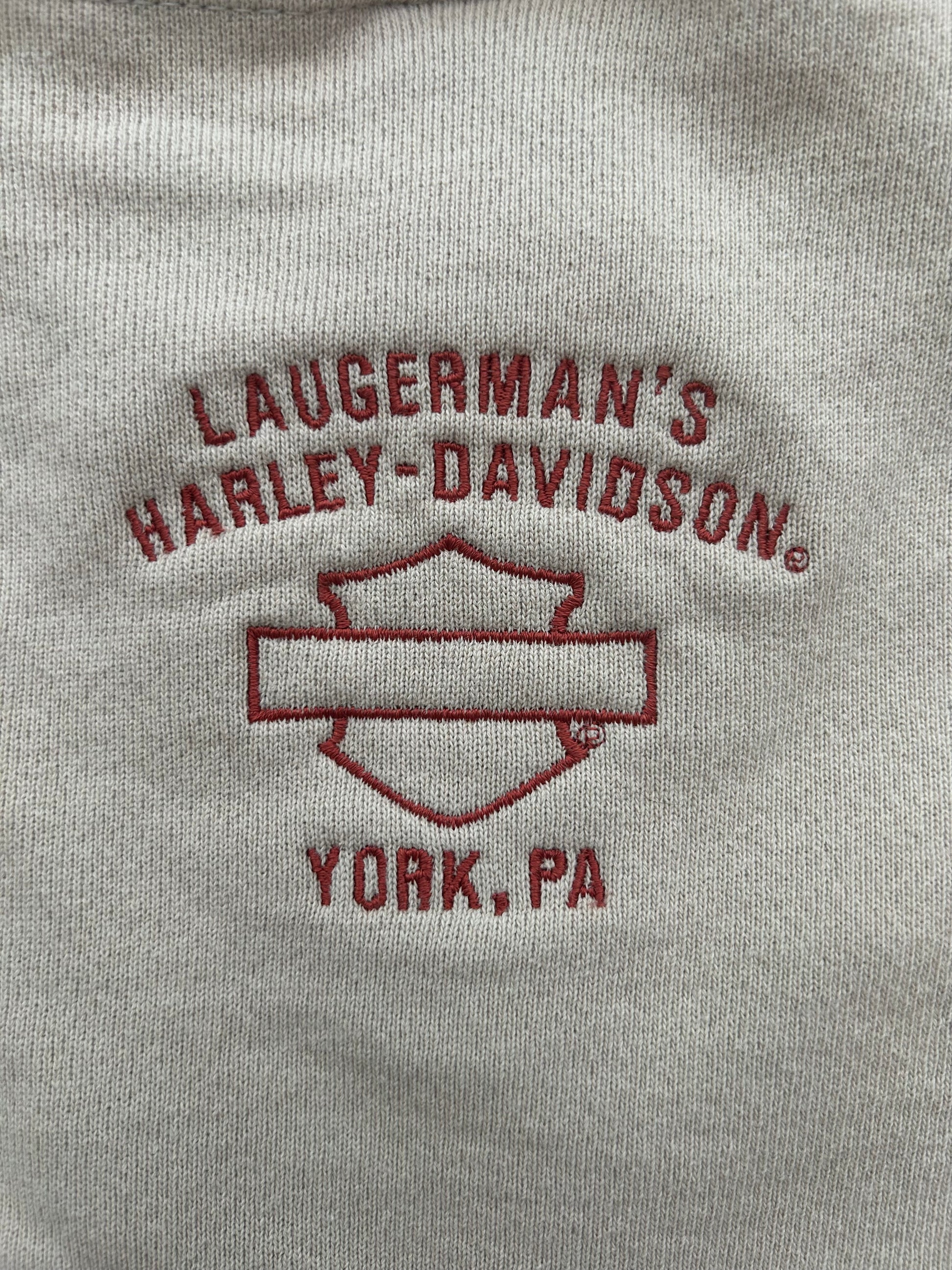 beige sweatshirt with 'Laugerman's Harley-Davidson York, PA' logo.